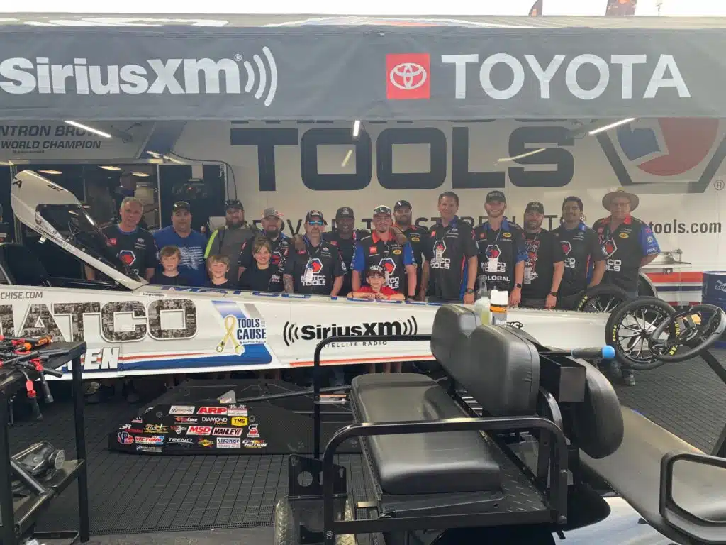 Guests gathered in the AB Motorsports pit-side pavilion