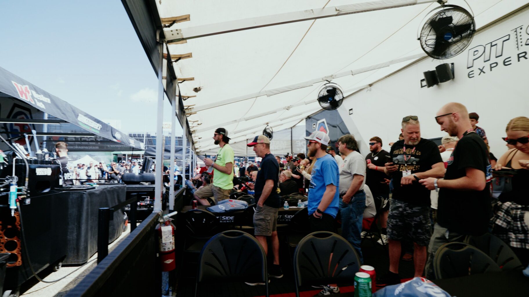 Guests gathered in the AB Motorsports pit-side pavilion