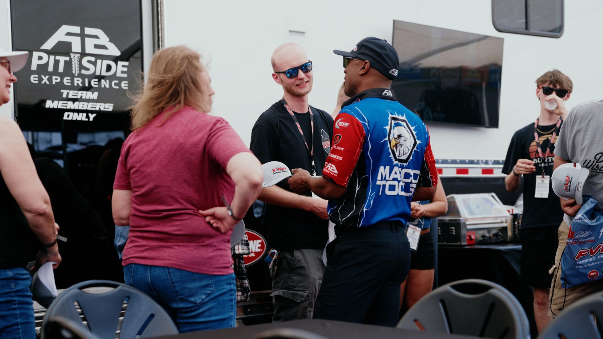 AB Motorsports guests and team inside the pit-side hospitality experience